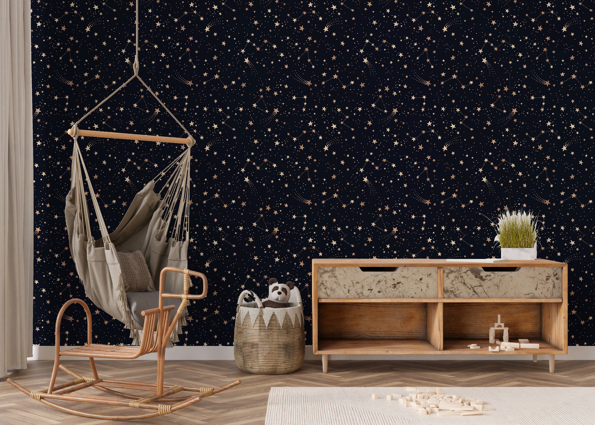Space themed wallpaper in play space.