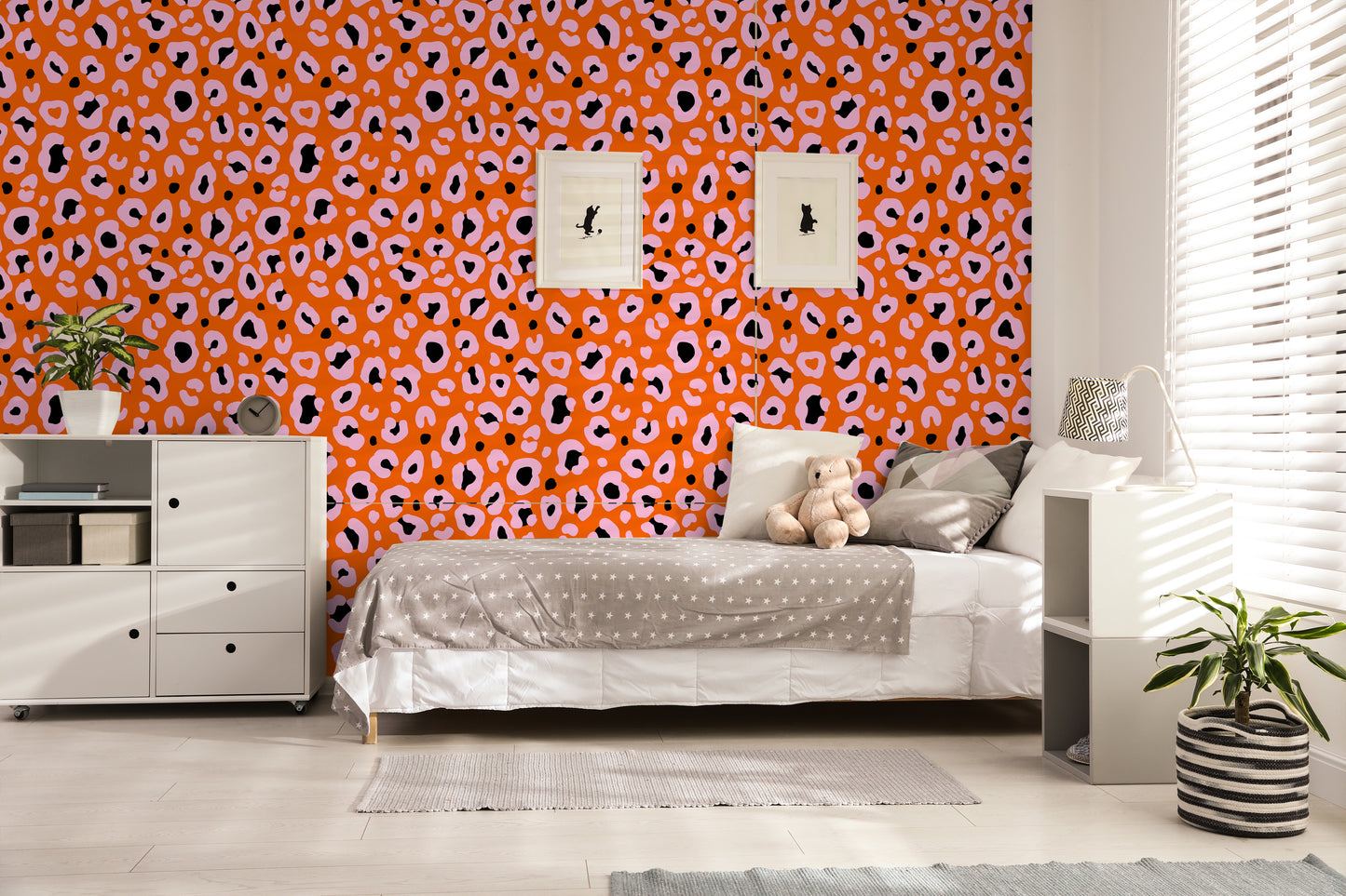 This modern leopard print wallpaper brings life to a traditional childrens room