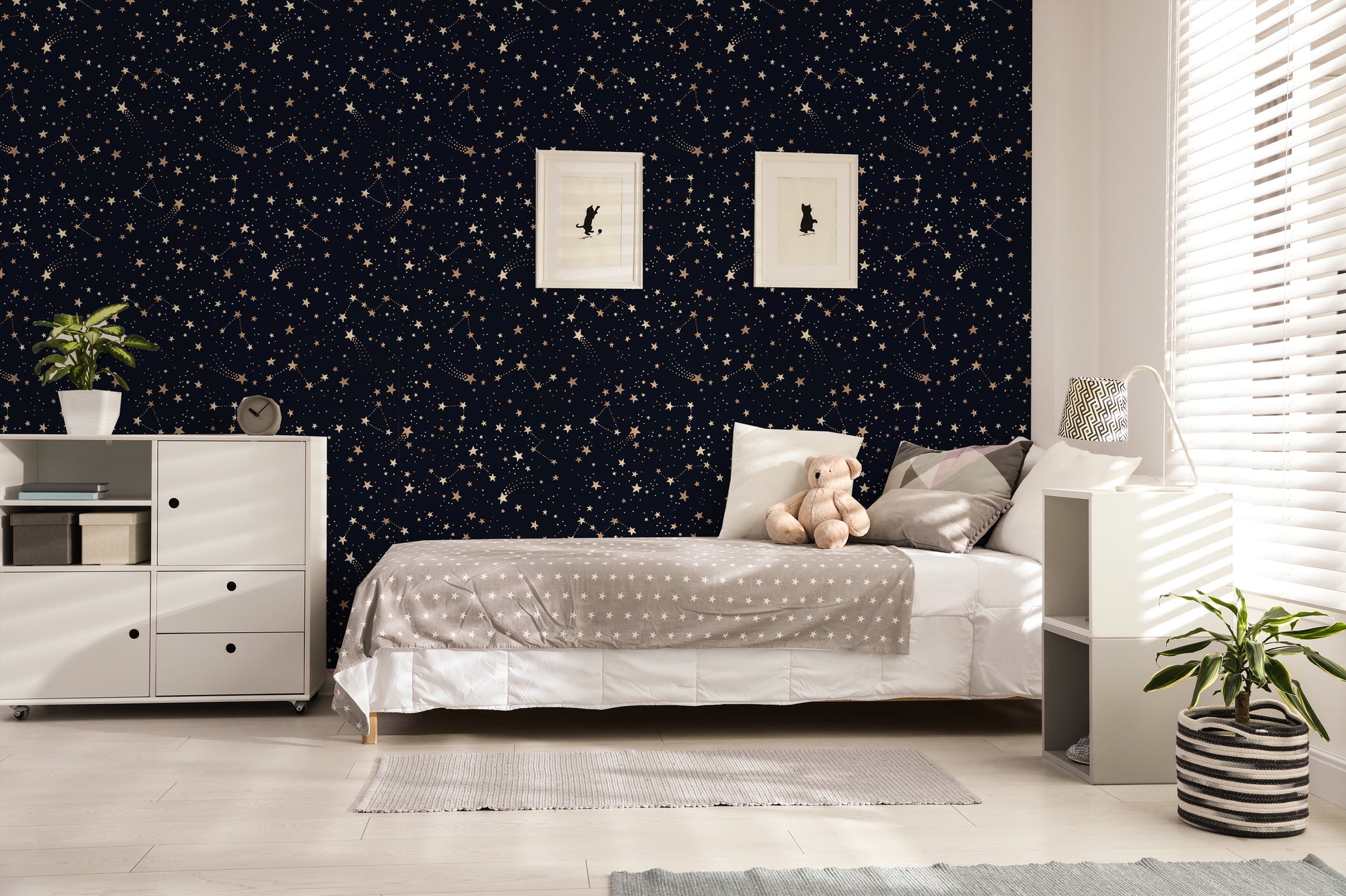 Childs bedroom featuring peel and stick star wallpaper