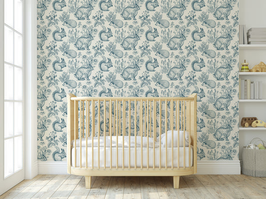 vintage woodland  easy removable peel and stick wallpaper in blue and cream  in a nursery